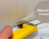 Mit einem gelben Werkzeug werden alte Silikonreste entfernt, um die Fugen zu erneuern.