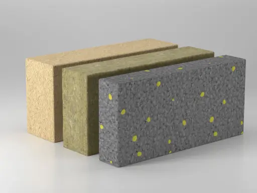Drei Schichten Dämmmaterial: Holzfaser, Steinwolle und ein diffusionsoffenes EPS-Material mit gelben Granulaten.