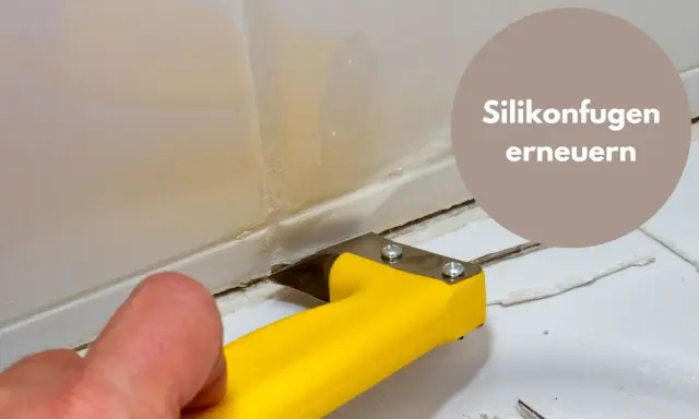Mit einem gelben Werkzeug werden alte Silikonreste entfernt, um die Fugen zu erneuern.