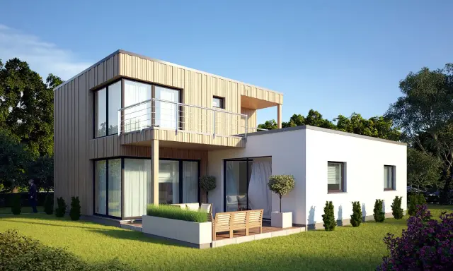 Modernes **Modulbau Haus** mit Holzfassade und Balkon, umgeben von einem gepflegten Garten.